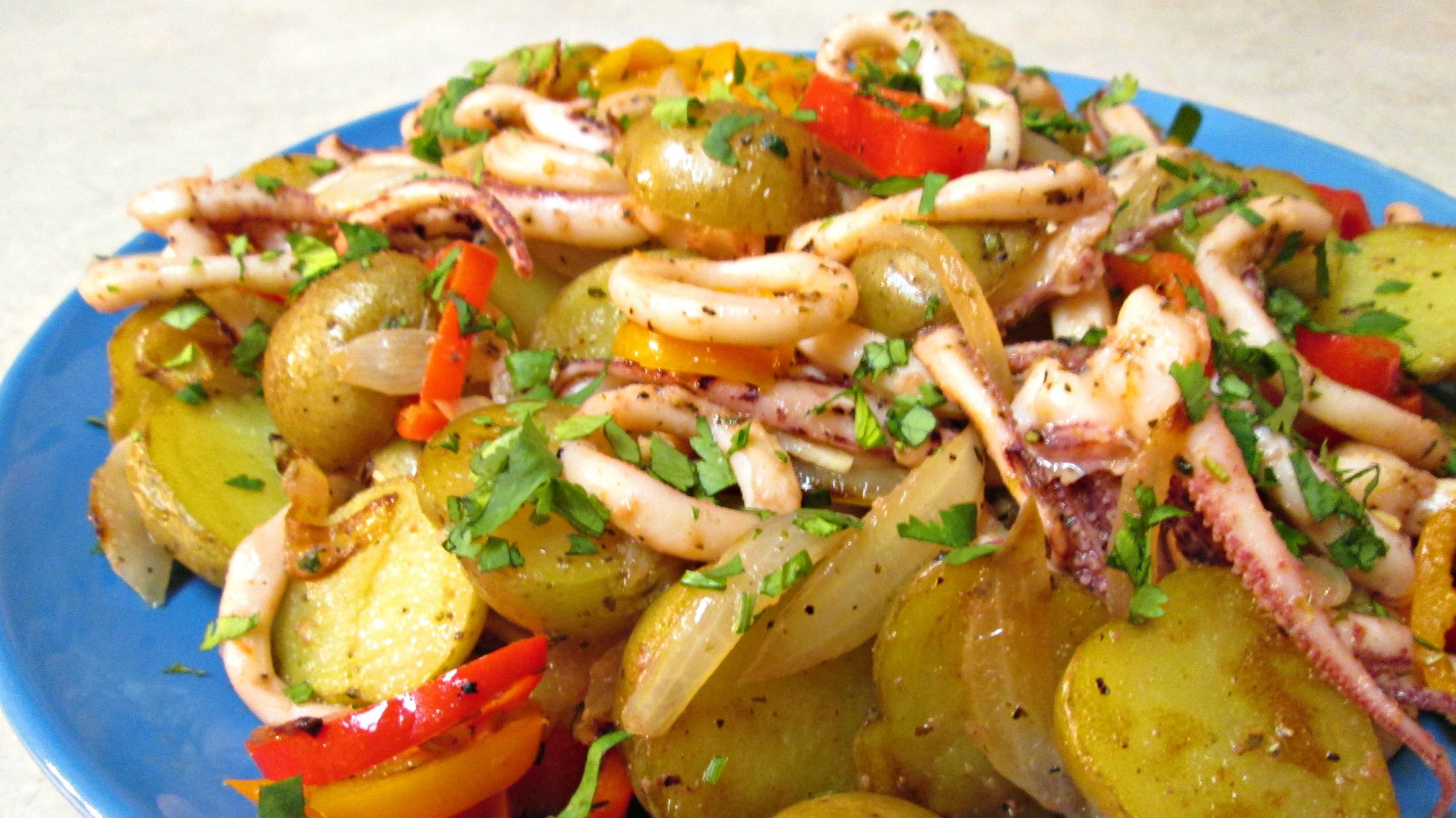 Sautéed Squid with Onions, Potatoes and Peppers