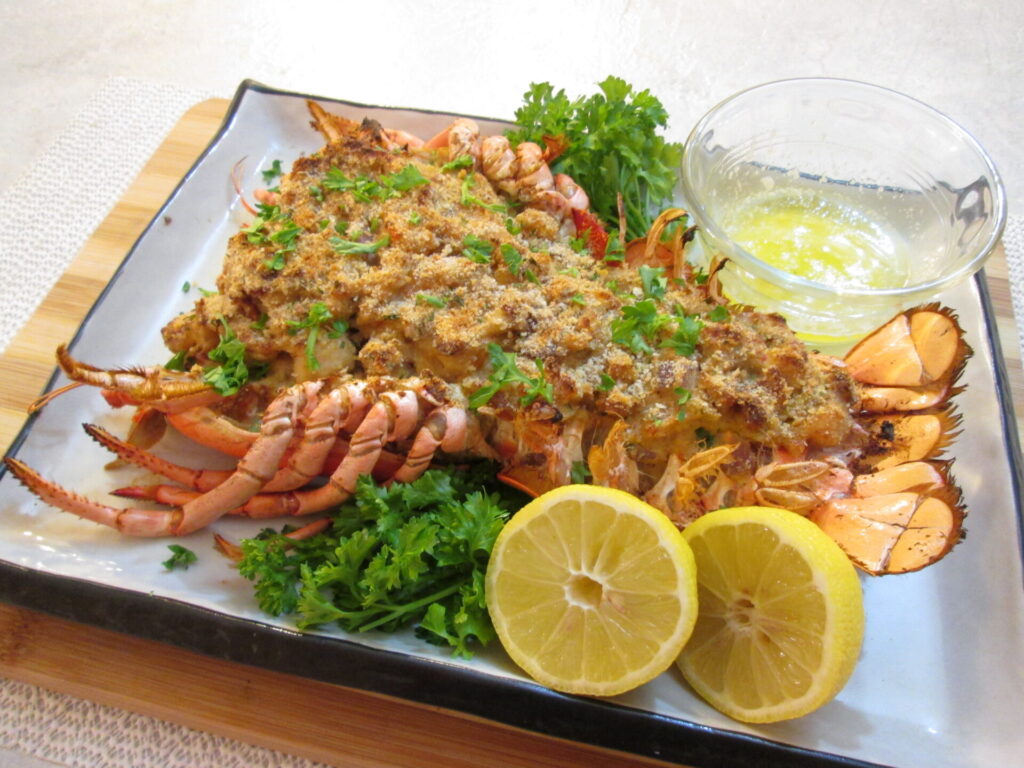 Close-up of creamy seafood stuffing with shrimp, scallops, and crab meat inside lobster