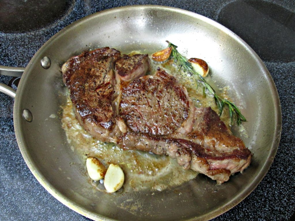 Frying ribeye steak in pan sale