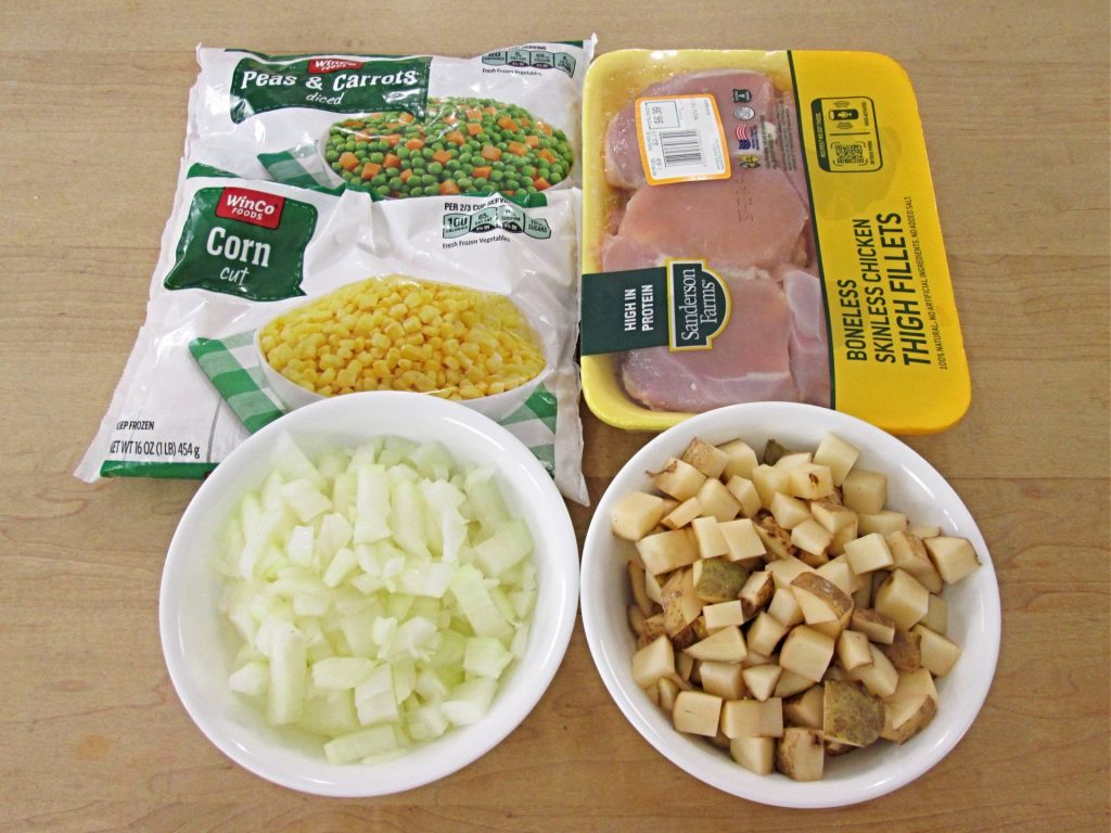 Ingredients for Chicken Corn Chowder: chicken, corn, potatoes, onions, and pea