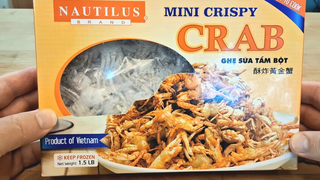 Frozen Vietnamese mini crabs in a box, ready to deep fry.