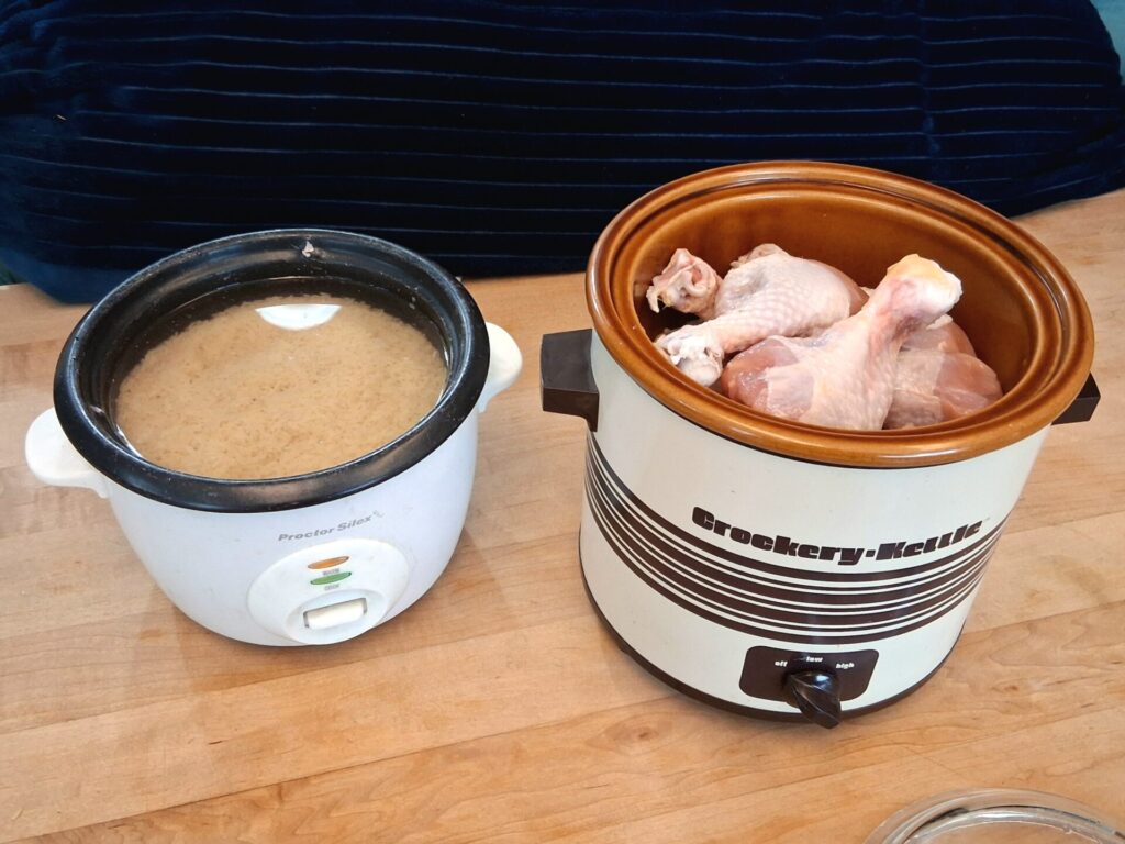 Homemade dog food prep: rice in the cooker, chicken in the crockpot—everything you need for a wholesome pup meal.